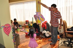 Rachel Taking a Go at the Piñata
